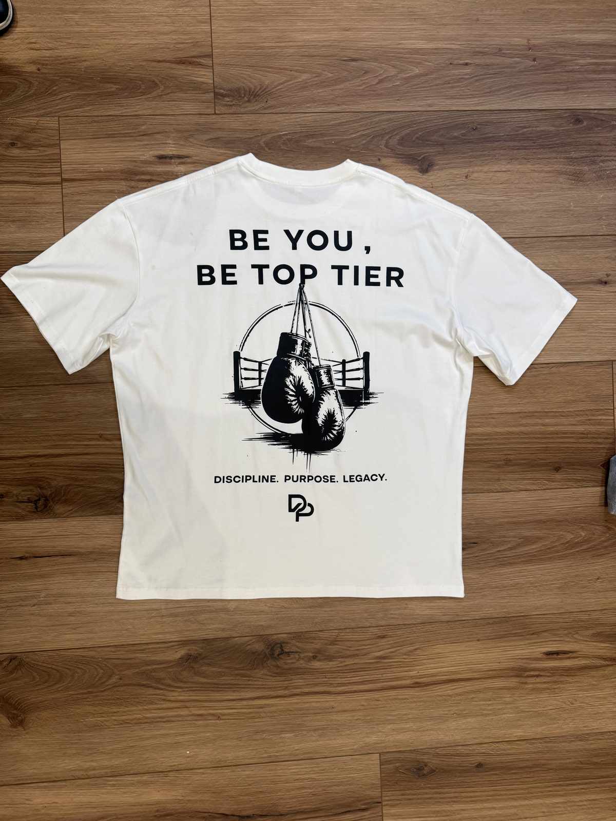DEPRYME — TOP TIER PERFORMANCE T-SHIRT